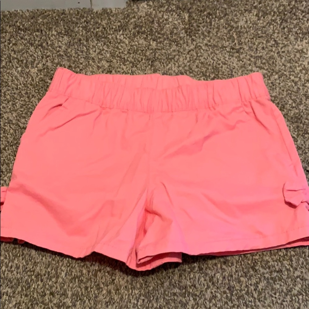 NWOT Carters pink shorts with bows on side